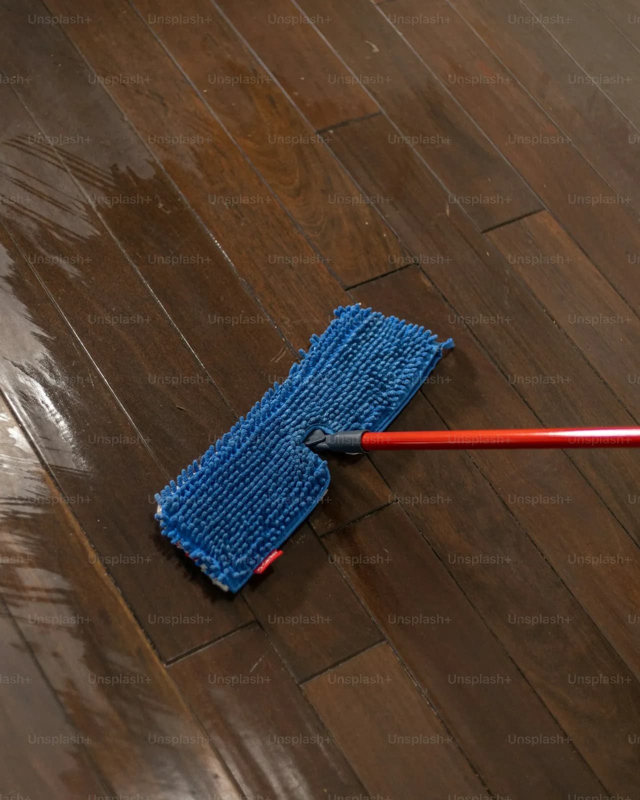 Floor scrubbing machine on a hard floor